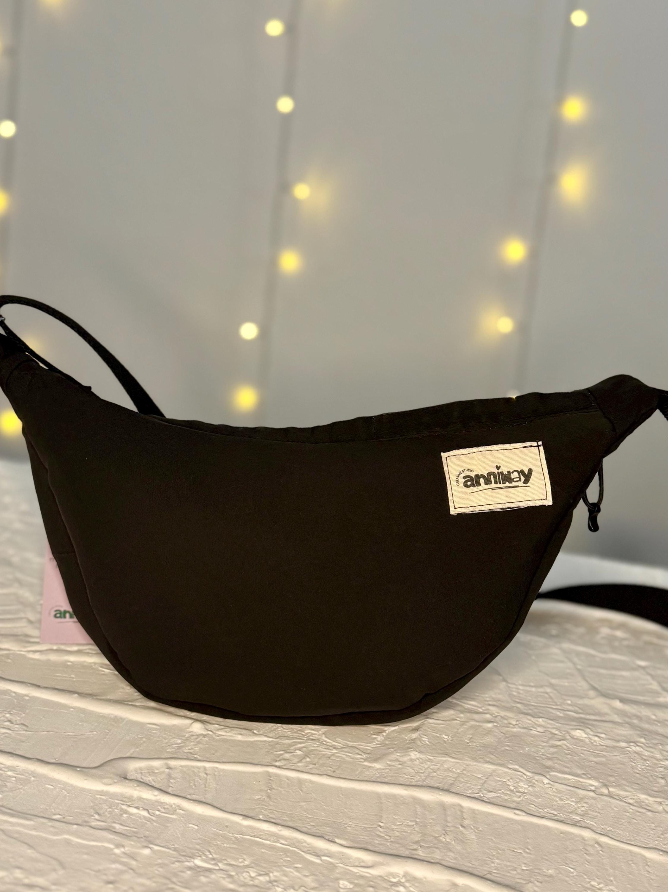 Handgemachte Umhängetasche (small) | schwarz | Upcycling aus Second Hand North Face Jacke | Einzelstück von Creative Studio Anniway